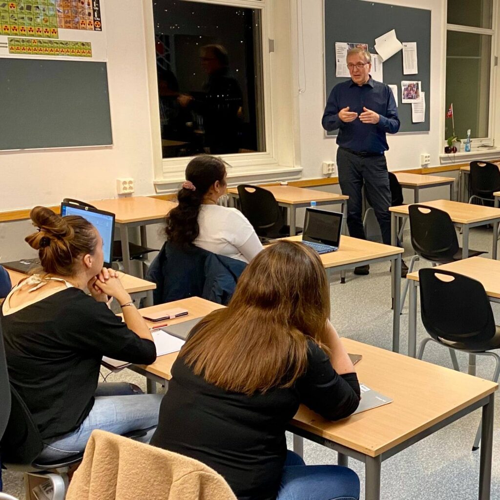 Students listening in a classroom